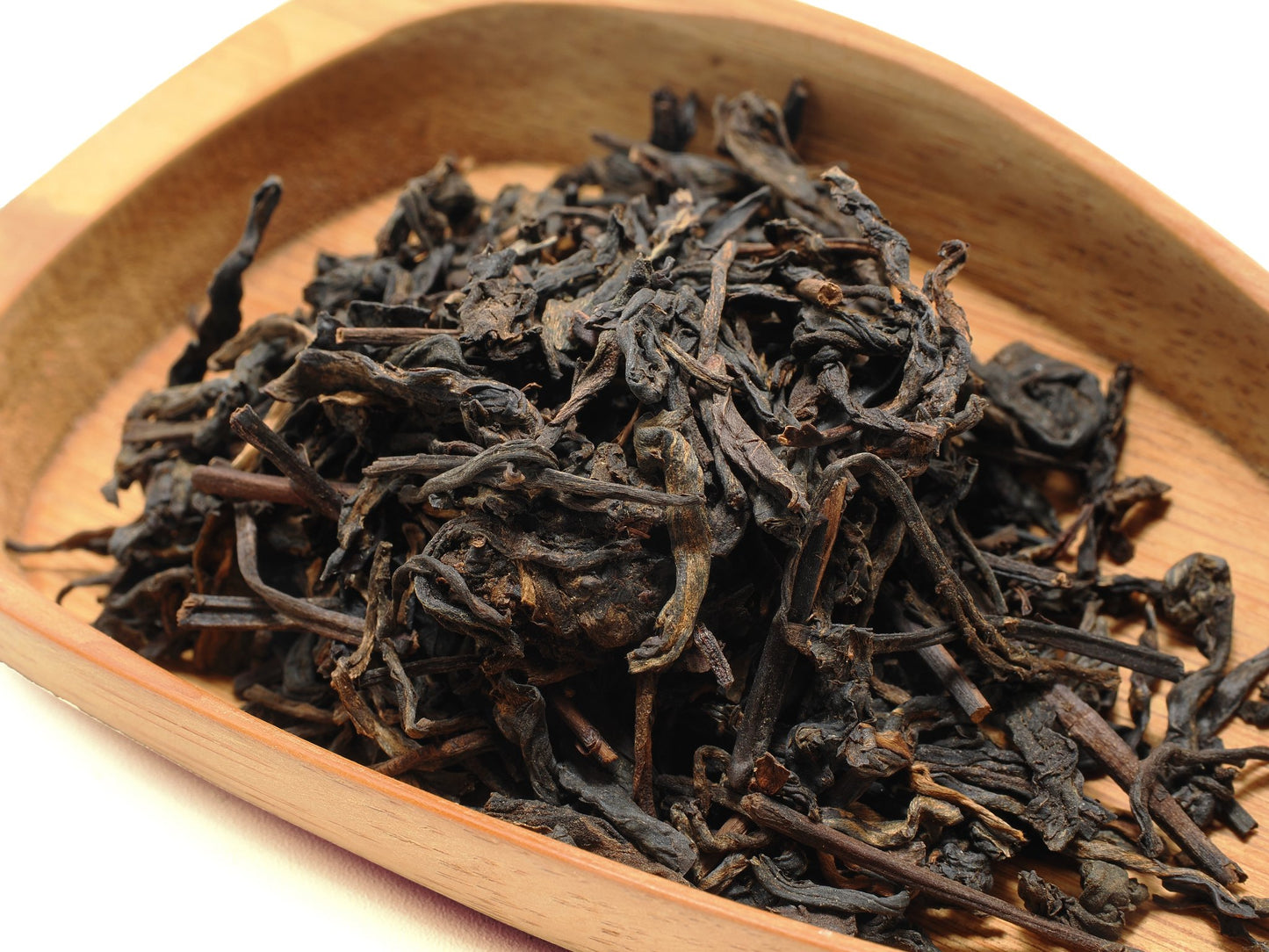 Close-up of traditionally-processed Liu Bao dry leaves from Cha Zhi Ji’s Malaysian aged collection