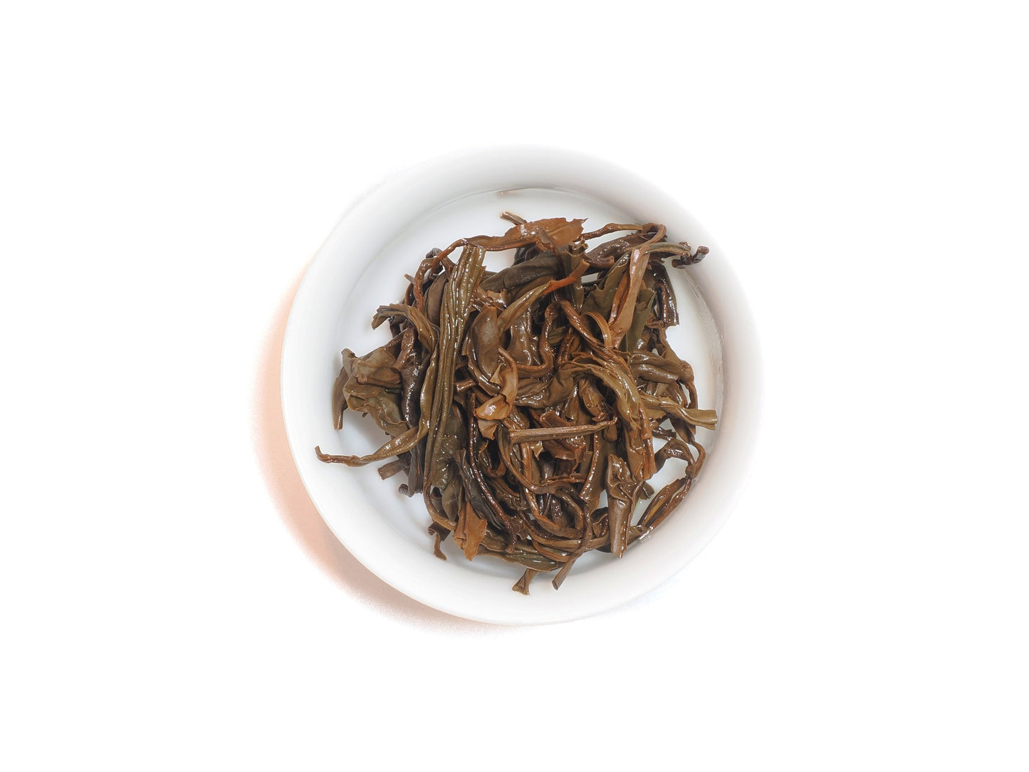 Top view of spent Nan Shan Ji Pin tea leaves after brewing
