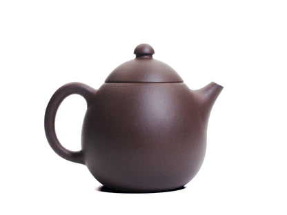 Right side view of the Da Long Dan teapot showing the curved spout and large rounded handle on the egg‑shaped body.