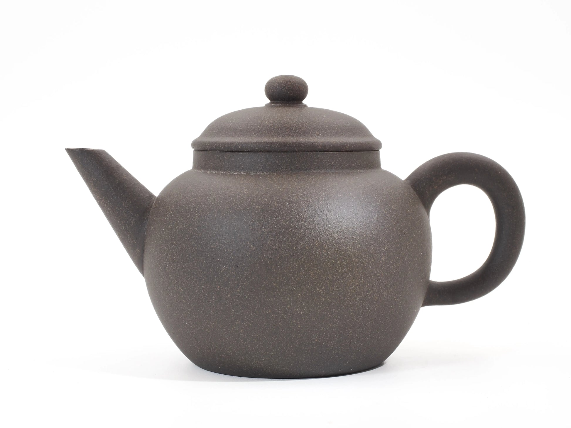 Side profile of the Gold Grade Mo Yuan Zhai teapot, displaying its warm, balanced Zisha clay tone and classic round shape.