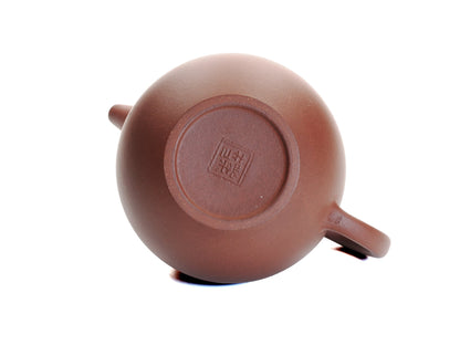 Bottom view of the Hong Pi Long Da Long Dan teapot showing the potter’s seal and smooth foot ring.