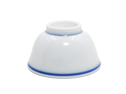 Bottom view of teacup highlighting blue line at the foot ring