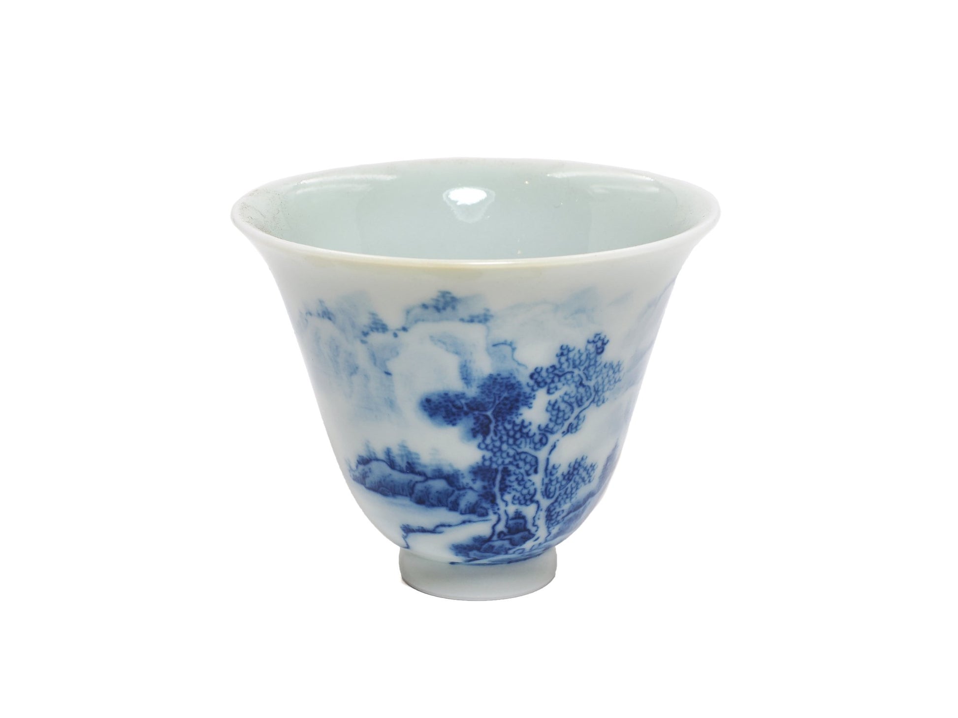 Angled view of landscape porcelain teacup, design 2