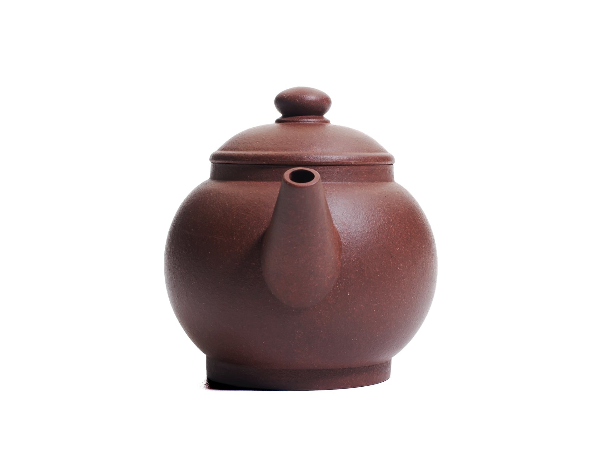 Front view of the Ju Lun Zhu teapot focusing on the spout and domed lid.