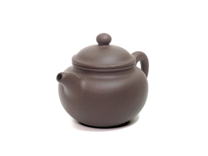 Angled front-left perspective of Lian Zi Yixing Teapot – smooth rounded profile