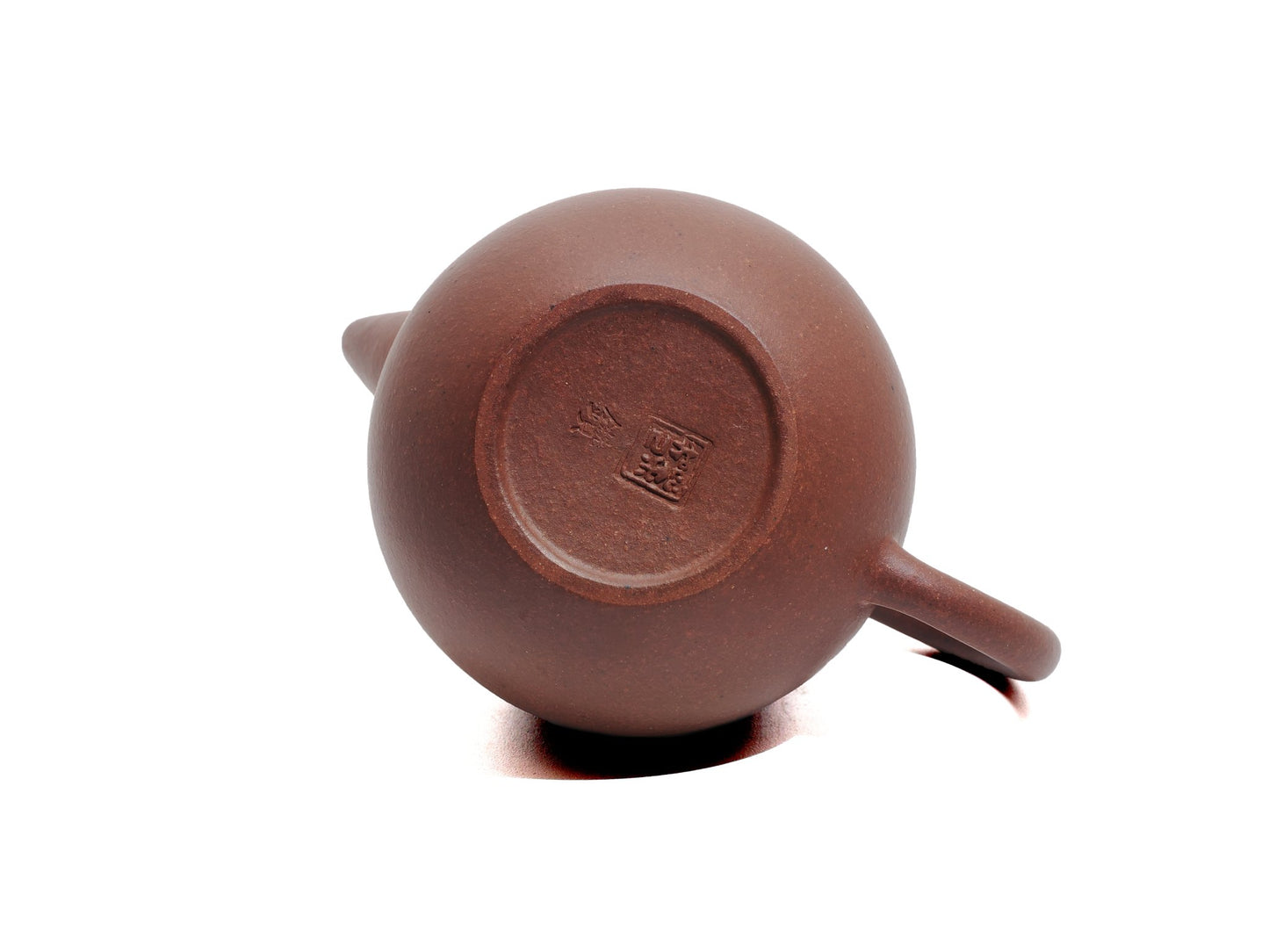 Base of Long Dan teapot with clay stamp and smooth finish