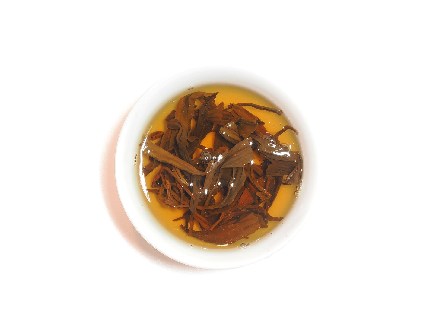 Nan Shan Ji Pin tea leaves steeping in golden liquor