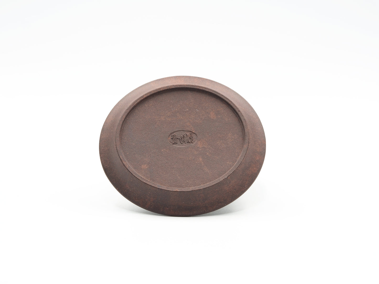 Bottom view of carved Yixing Tea Coaster in Bronze Grade clay with maker’s mark