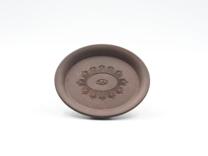 Front view of Oval Yixing Tea Coaster showing carved lotus flower design