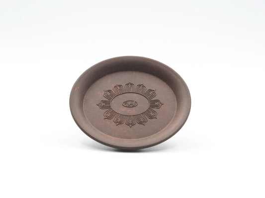 Front view of Oval Yixing Tea Coaster showing carved lotus flower design