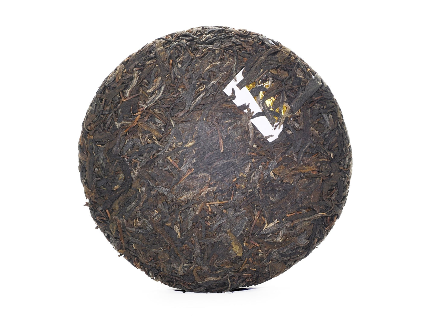 Unwrapped tea cake front with embedded ticket (neifei)