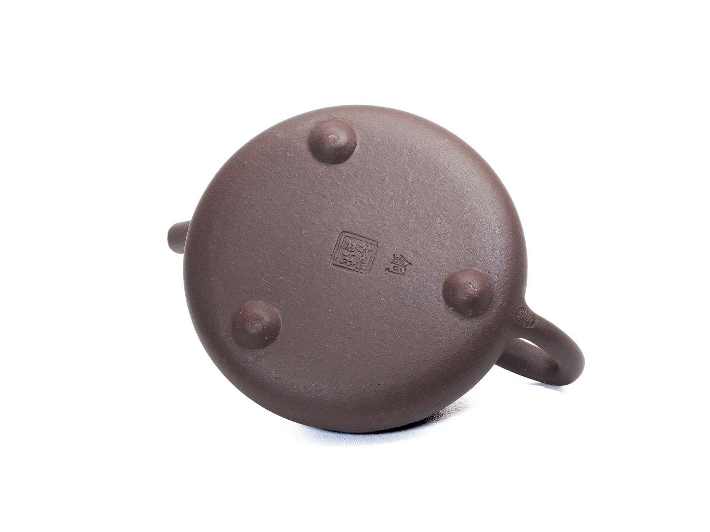 Base of teapot showing potter’s stamp