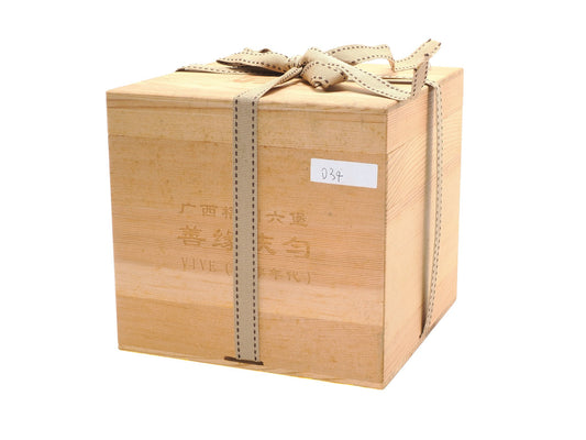 Angled view of VIVE 1980s Liu Bao Tea wooden box