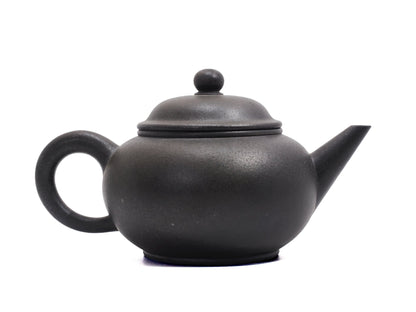 Opposite side view of Wood Fired “22 Cups” Shui Ping Yixing Teapot – 320ml Bronze Grade Purple Clay