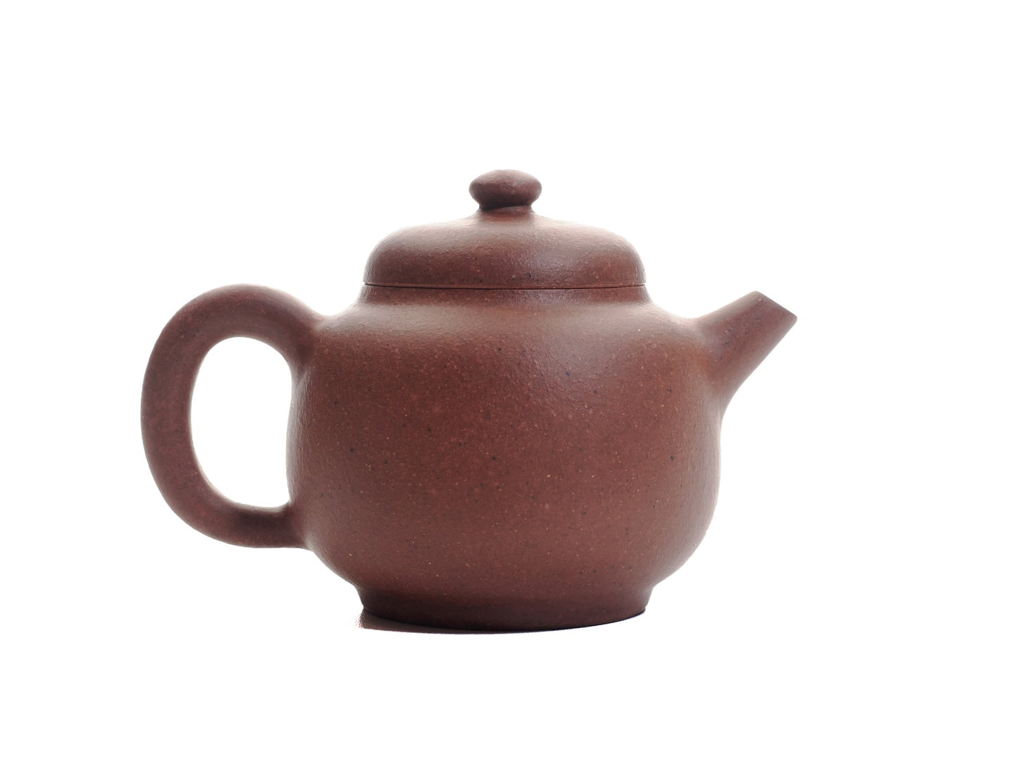 Right side view of the Xiao Da Bin 50 ml Yixing teapot revealing the smooth purple clay surface and ergonomic handle.