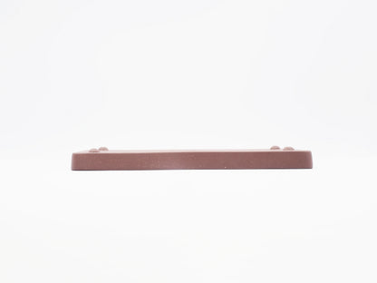 Angled side view of the Yixing clay tea tray's base and feet