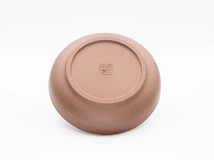 Underside of the Yixing clay tea boat showing the artisan's seal stamp
