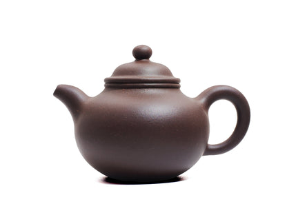 Left side view of Da Heng Duo Qiu Yixing teapot, 150ml Bronze-grade purple clay