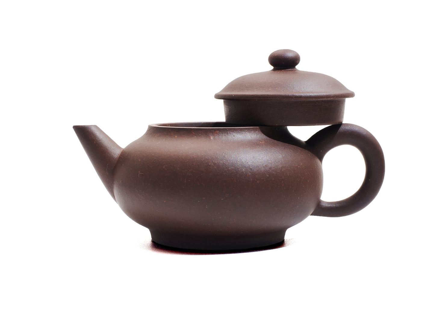 Front view of Cha Zhi Ji Yixing teapot Junde made from bronze grade purple clay