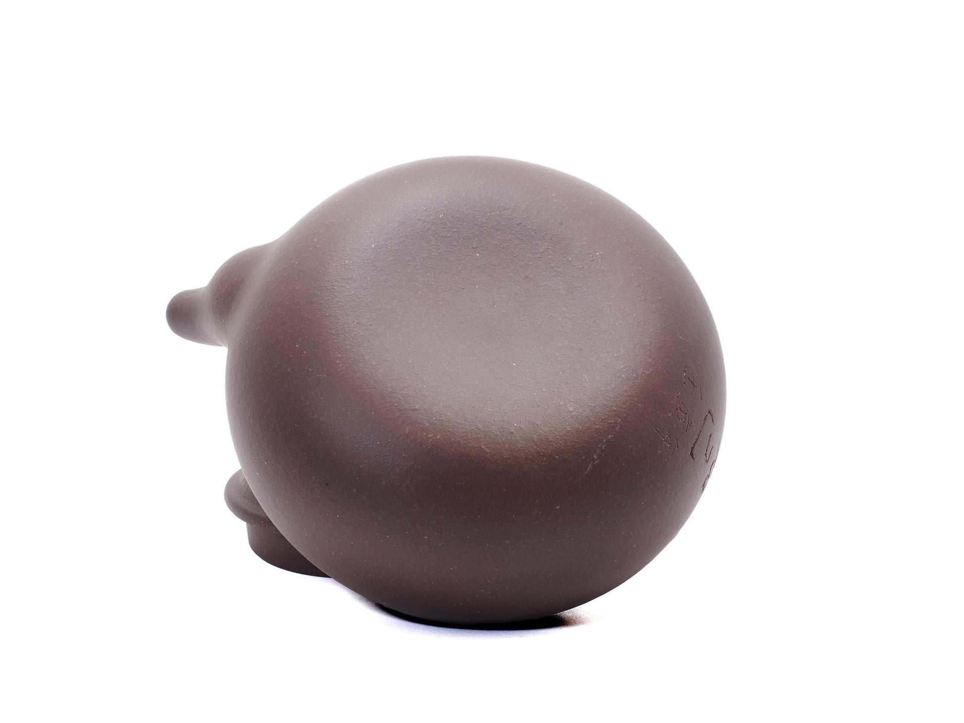 Bottom view of Zhu Shui Hu teapot showing base texture and finish